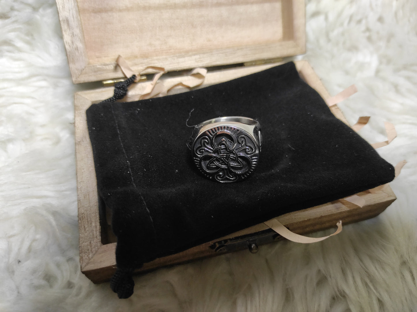 Viking ring with triquetra in a wooden gift box