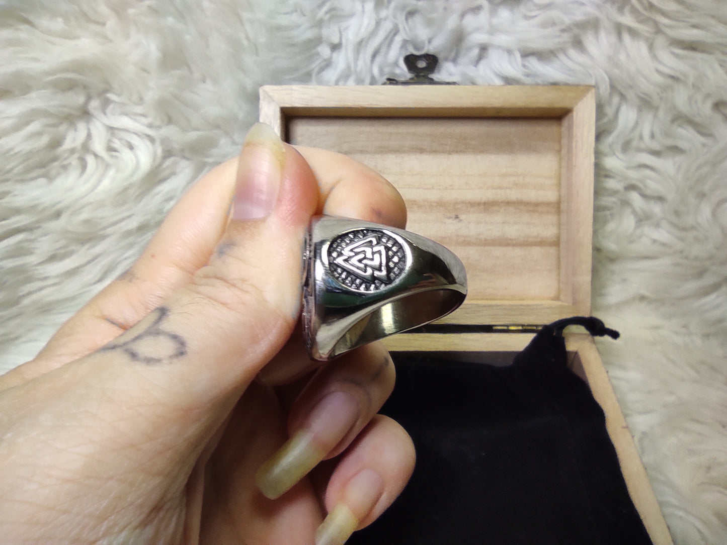 Viking ring with triquetra in a wooden gift box