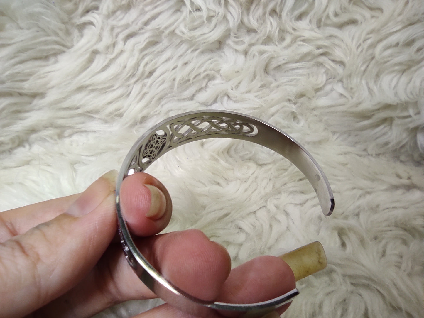 Expandable bracelet with protective symbol